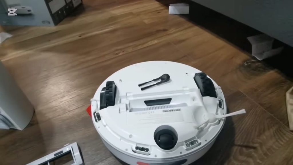 Undersidan av Xiaomi H40 med huvudborste och sidoborste